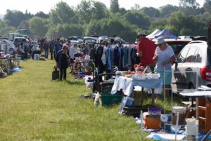 People Shopping At A Car Boot Sale