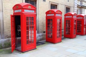 Row of traditional red telephone boxes