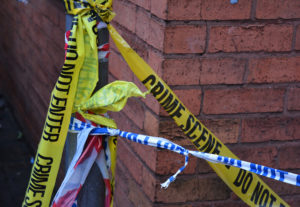 Remnants of crime scene tape left after an incident