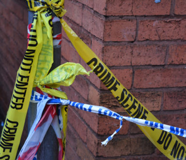 Remnants of crime scene tape left after an incident