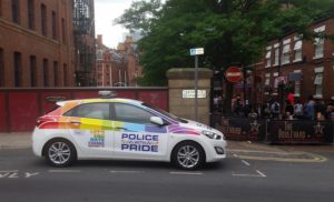 Police car parked by residential street