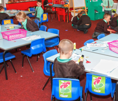 Children in a classroom doing art activities