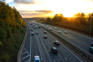 View down one part of the M25 flanked by trees and bushes