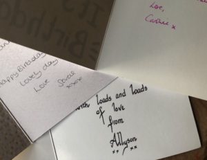 Cards from people who have all added an X after their name