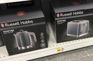 supermarket shelf showing kettle and toaster for sale